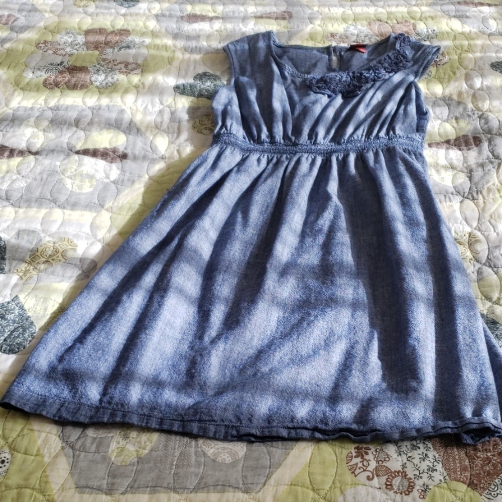 Knee length dress.